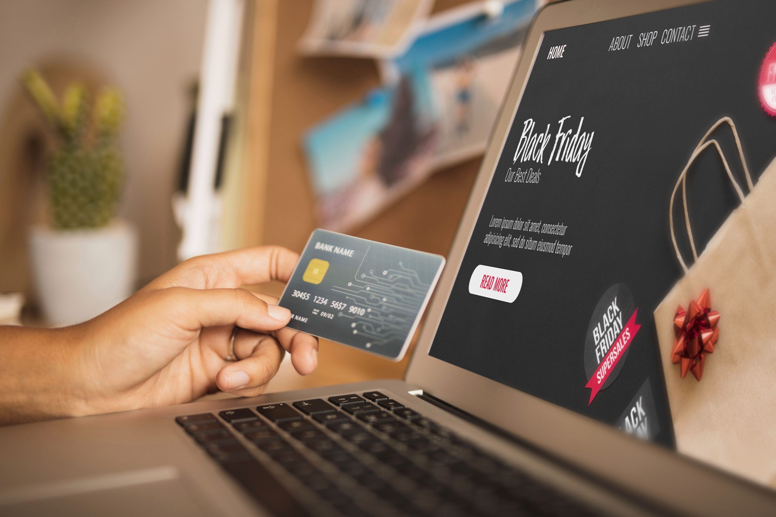 Credit card and laptop representing online payment processing
